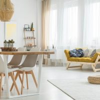 blue-pillow-on-a-mustard-sofa-PEDPEEA.jpg