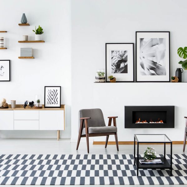 fireplace-between-grey-armchairs-in-modern-living-ZGW5NFK.jpg